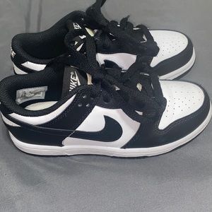 Black and whit low top Dunks